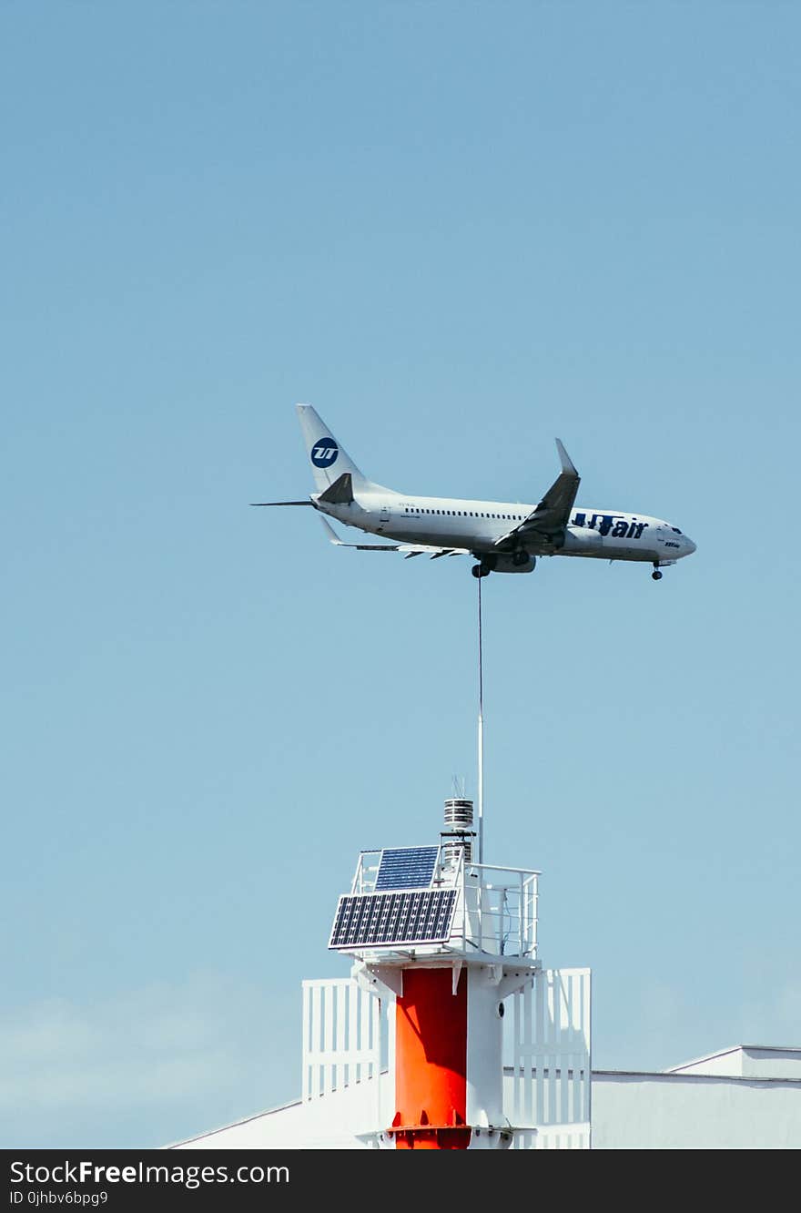 Photo of Airplane on Top of Building