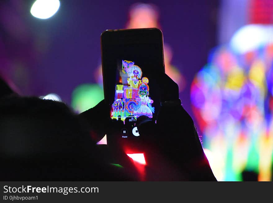 Person Holding Smartphone