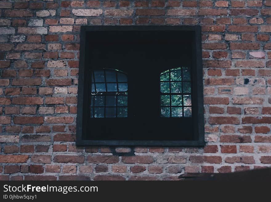 Square Black Window on Concrete Wall