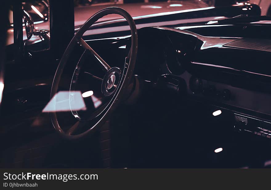 Classic Car Interior Showing Wooden Steering Wheel