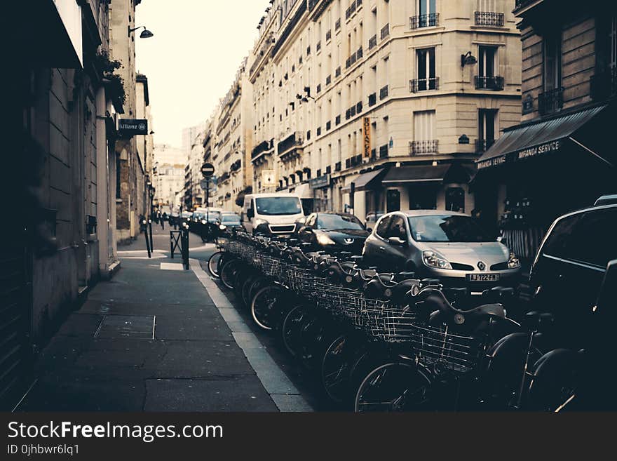 Photography of Parked Bicycles Near Buildings