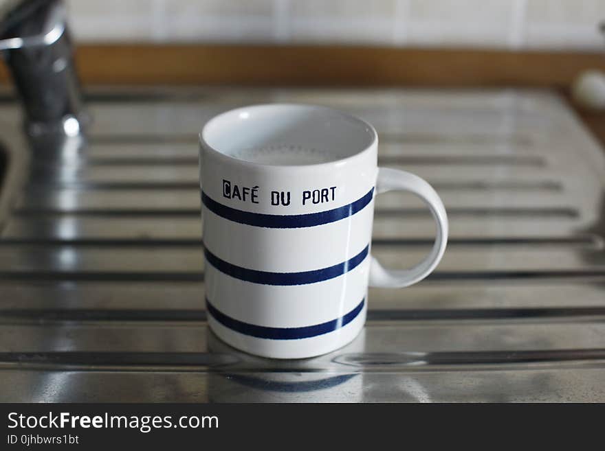 White and Black Ceramic Mug