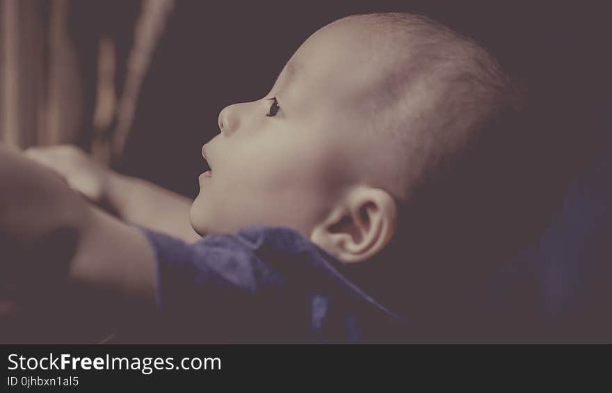 Baby Wearing Blue Shirt