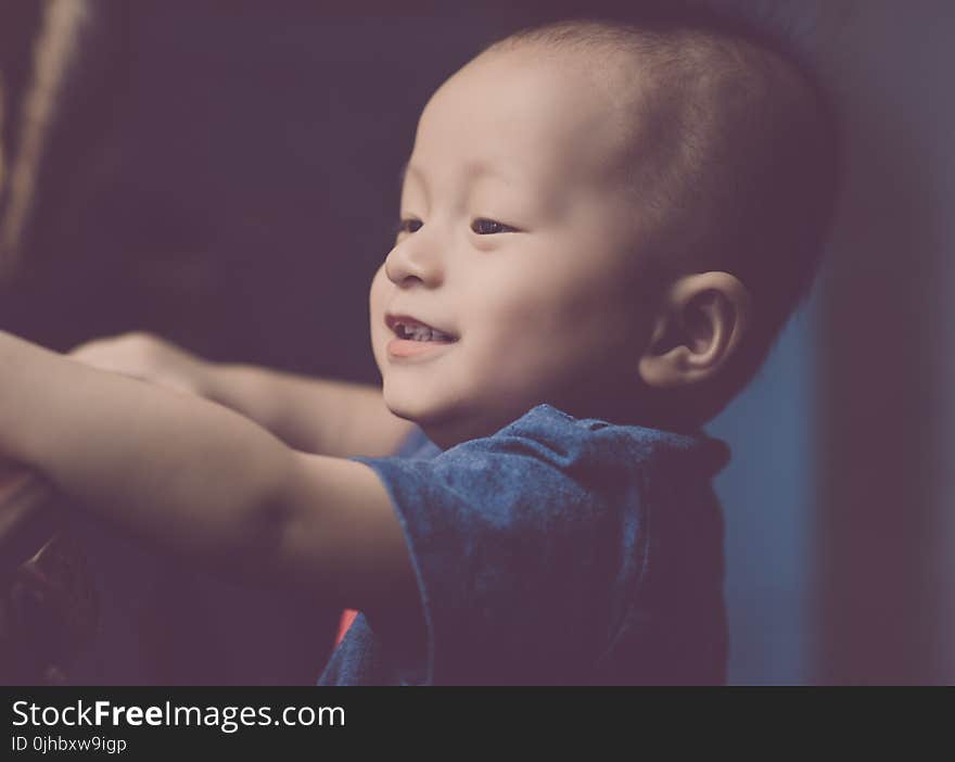 Close-Up Photography of a Smiling baby