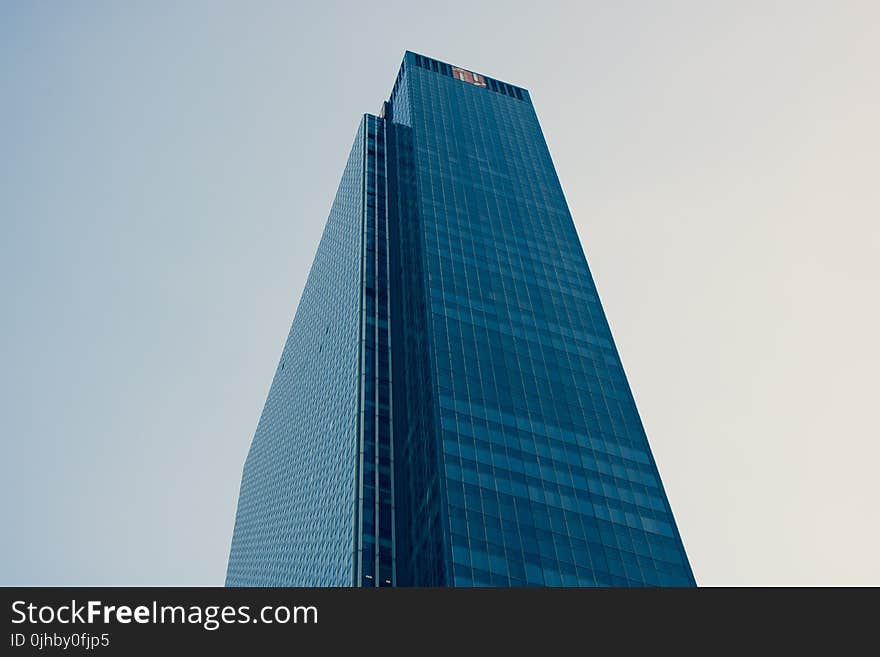 Low Angle Photography of Curtain Building Under White Sky