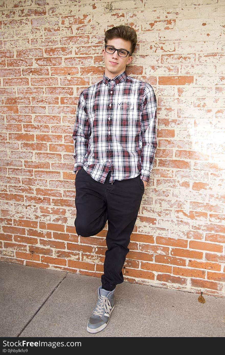 Man Wearing Red And White Plaid Dress Shirt And Black Pants