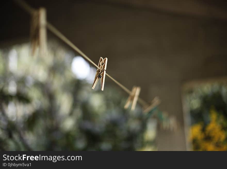 Selective Focus Photography of Clothes Hanger Clip