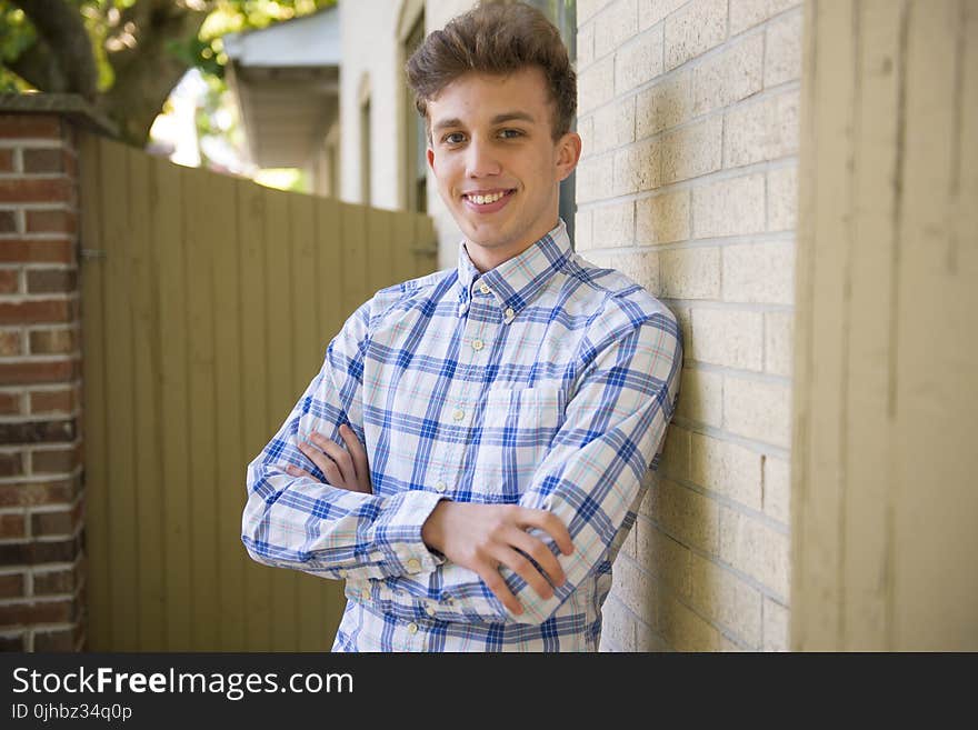 Man Wearing Blue And White Shirt