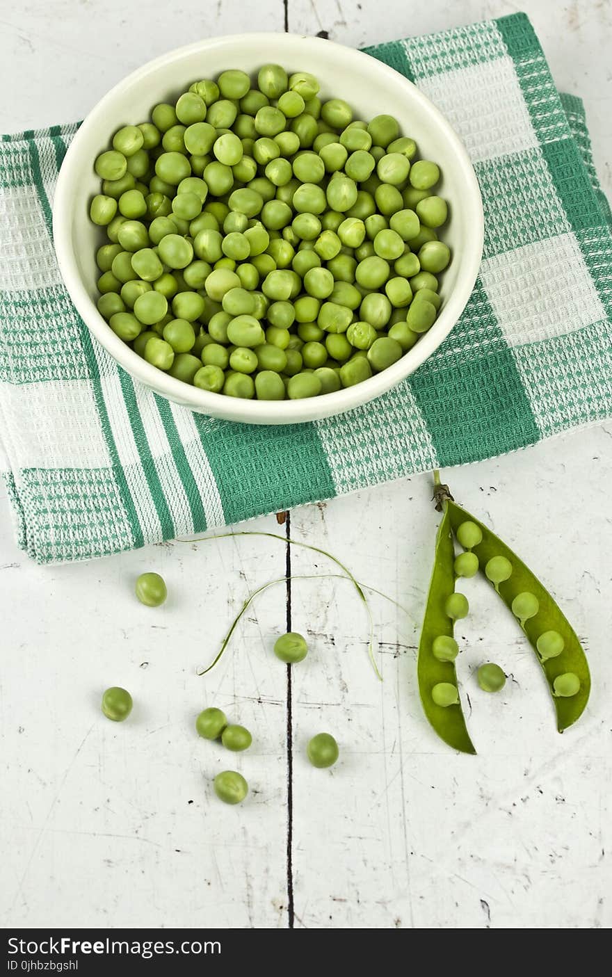 Green Peas On White Ceramic Bowl