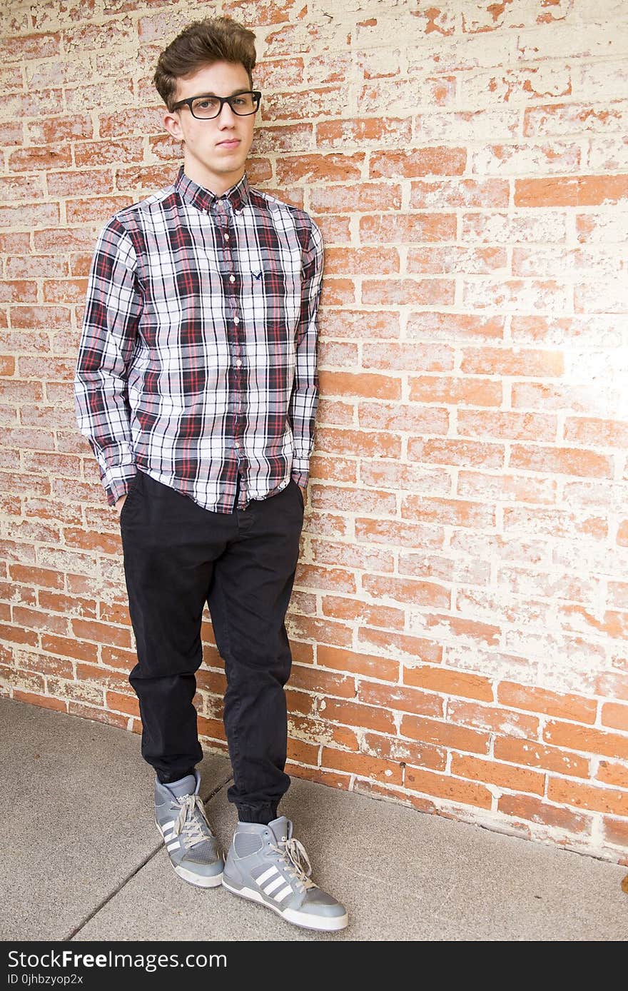 Man Wearing Plaid Dress Shirt And Black Pants