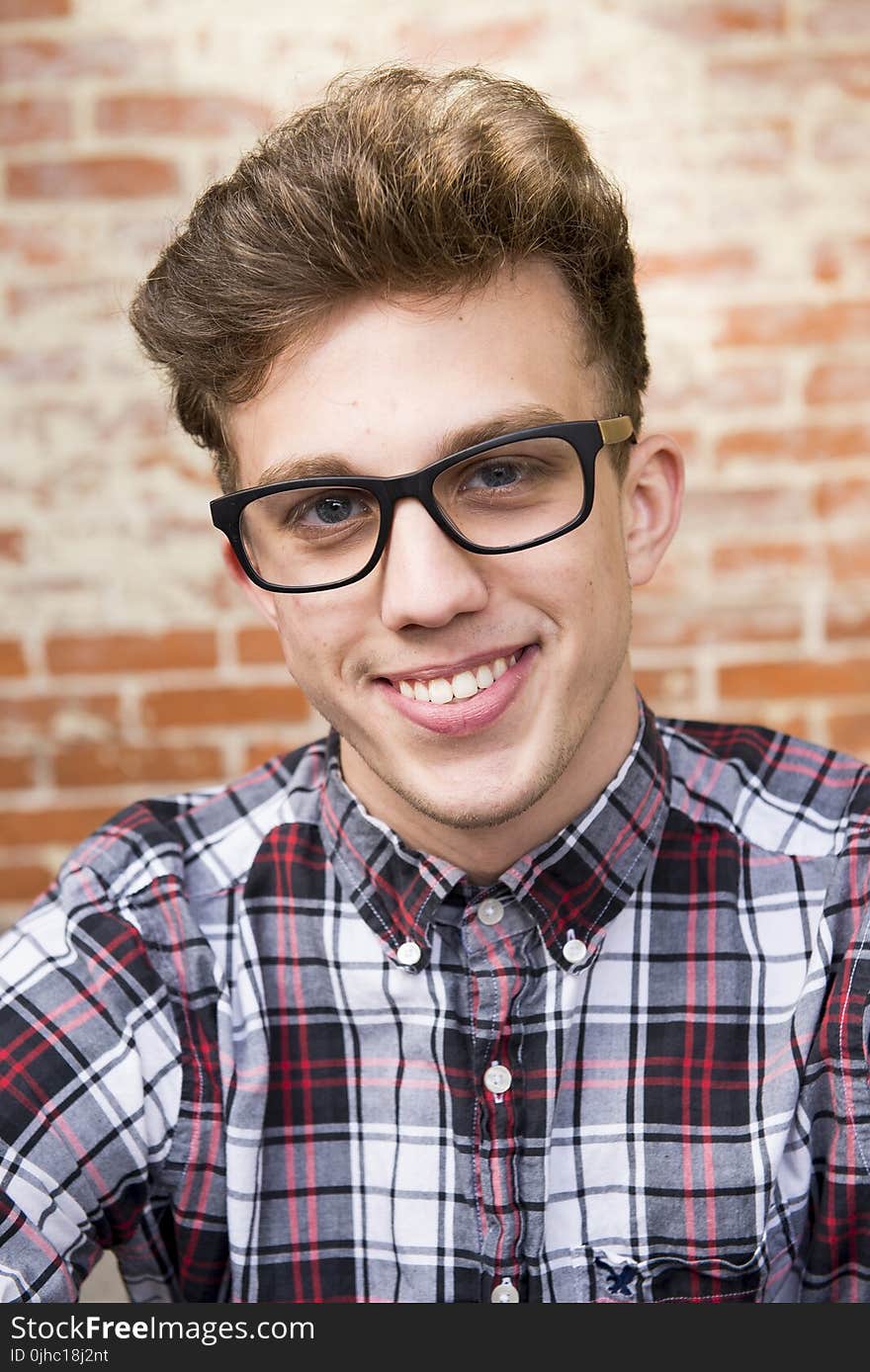 Man Wearing Eyeglasses And Smiling