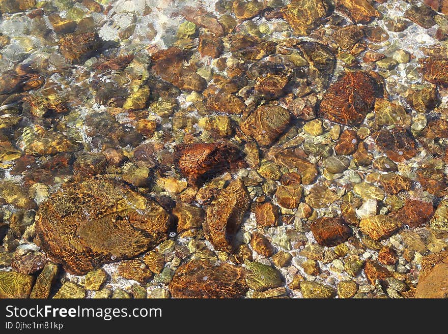 Stones Under Clear Water