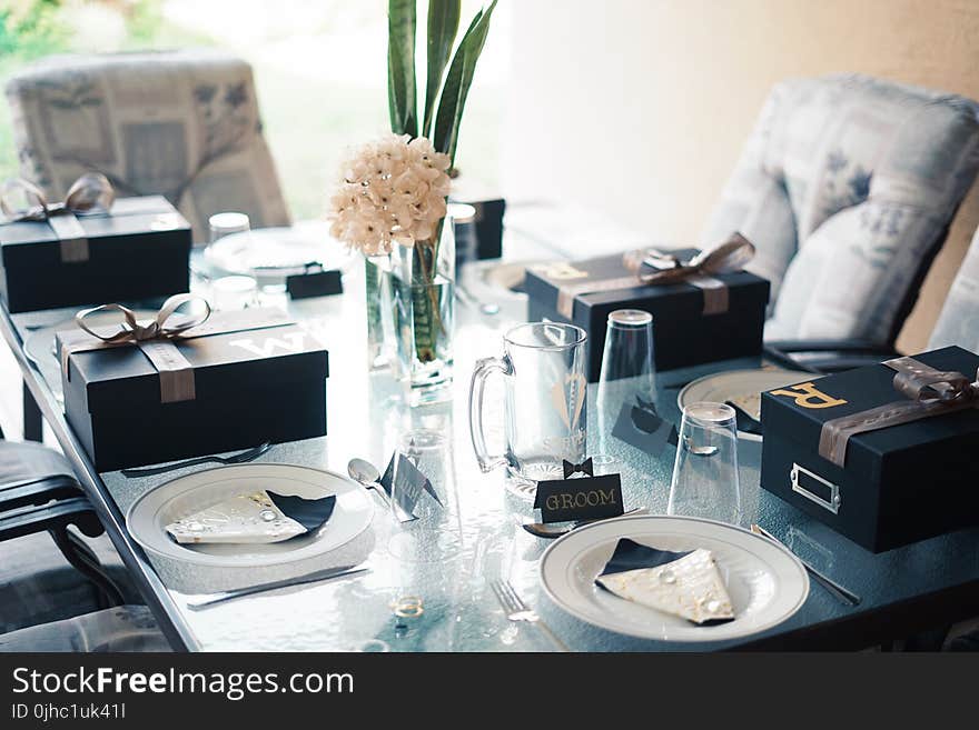 White Petaled Flower in Clear Glass Flower Vase on Table