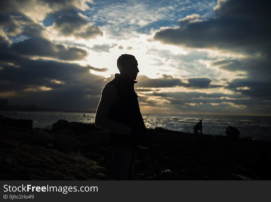 Silhouette of Man during Sunrise