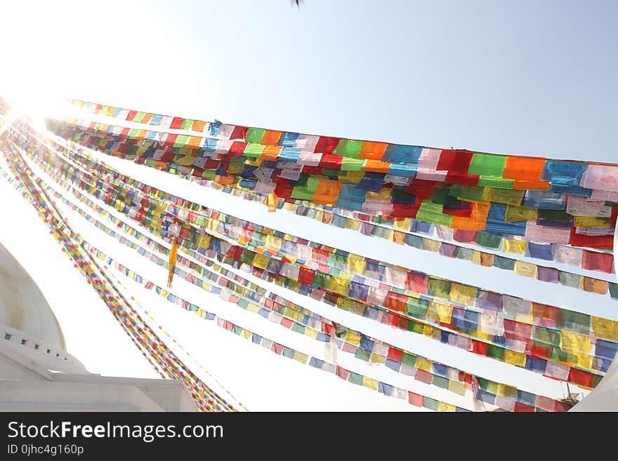 Shallow Focus Photography of Bunting Flags