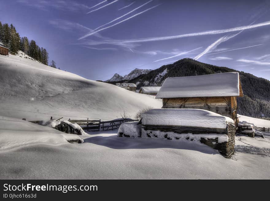 Brown Wooden House Covered With Snow