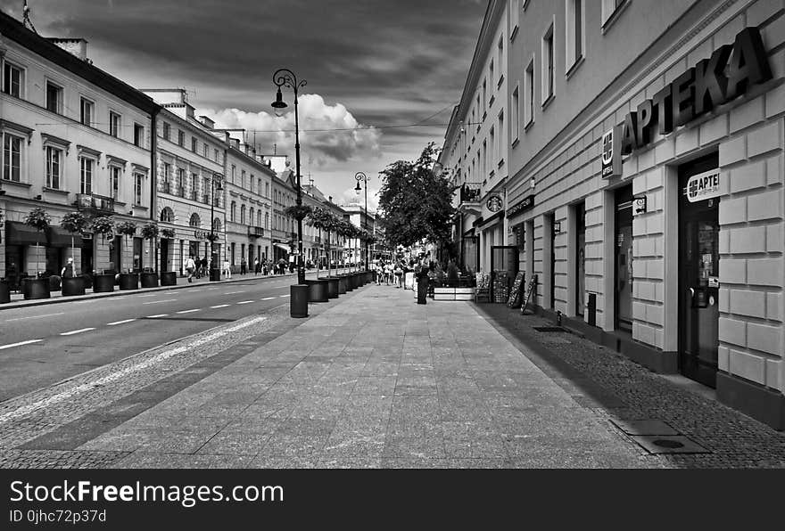 Greyscale Photo Of Road With Buildings