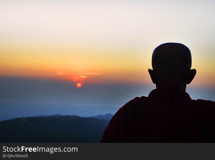 Silhouette of Man during Golden Hour