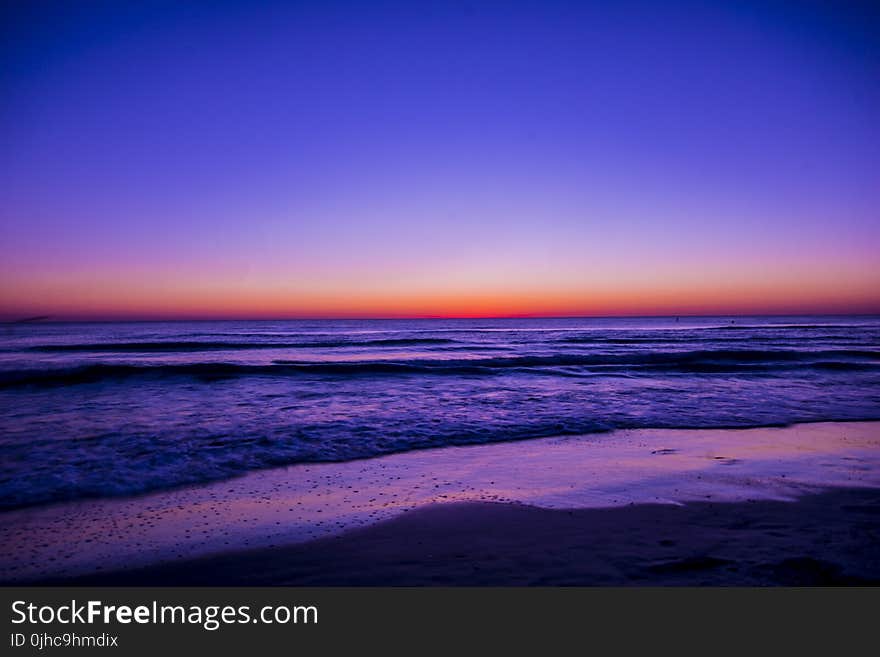 Scenic View of Ocean During Dawn