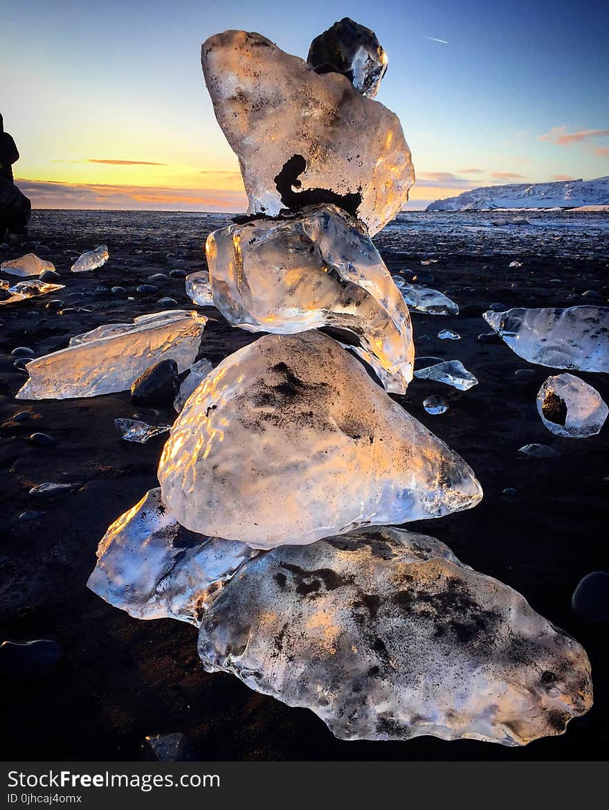 Close Up Photo of Ice Stone on the Ground