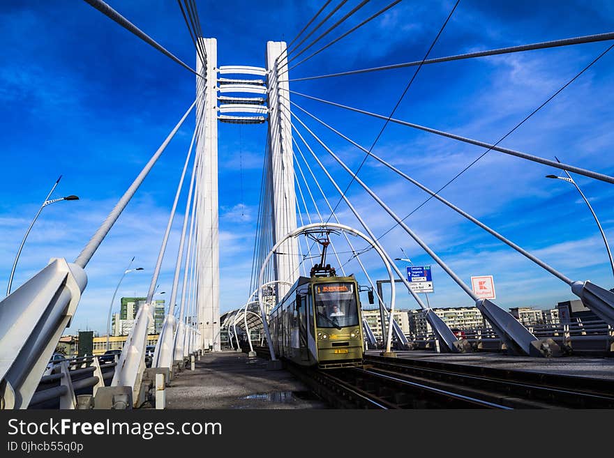 Bridge With Train Under Blue Sky