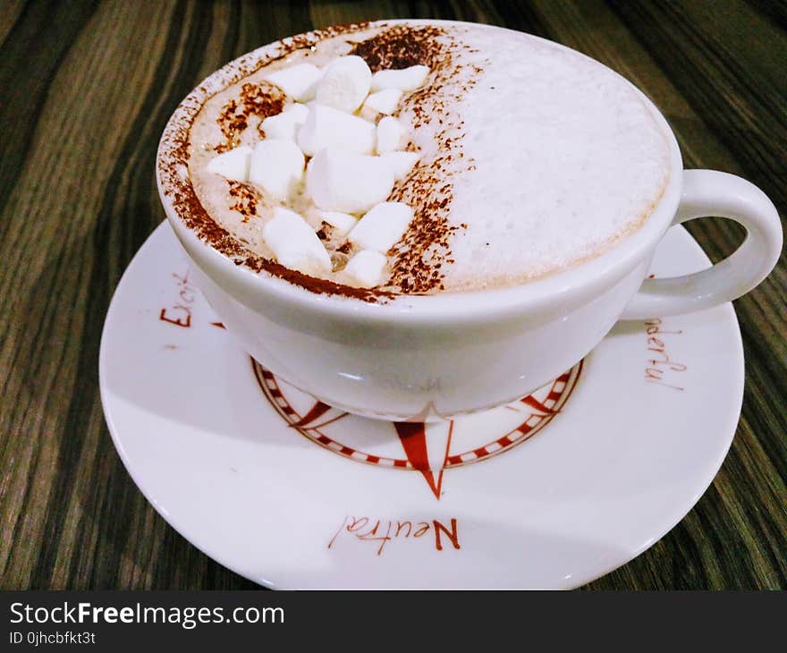 Photo of White and Brown Frappe on Ceramic Tea Cup