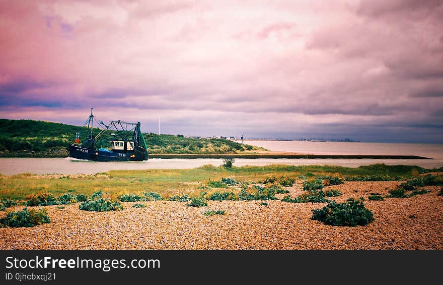 Black Galleon Ship on River Photo