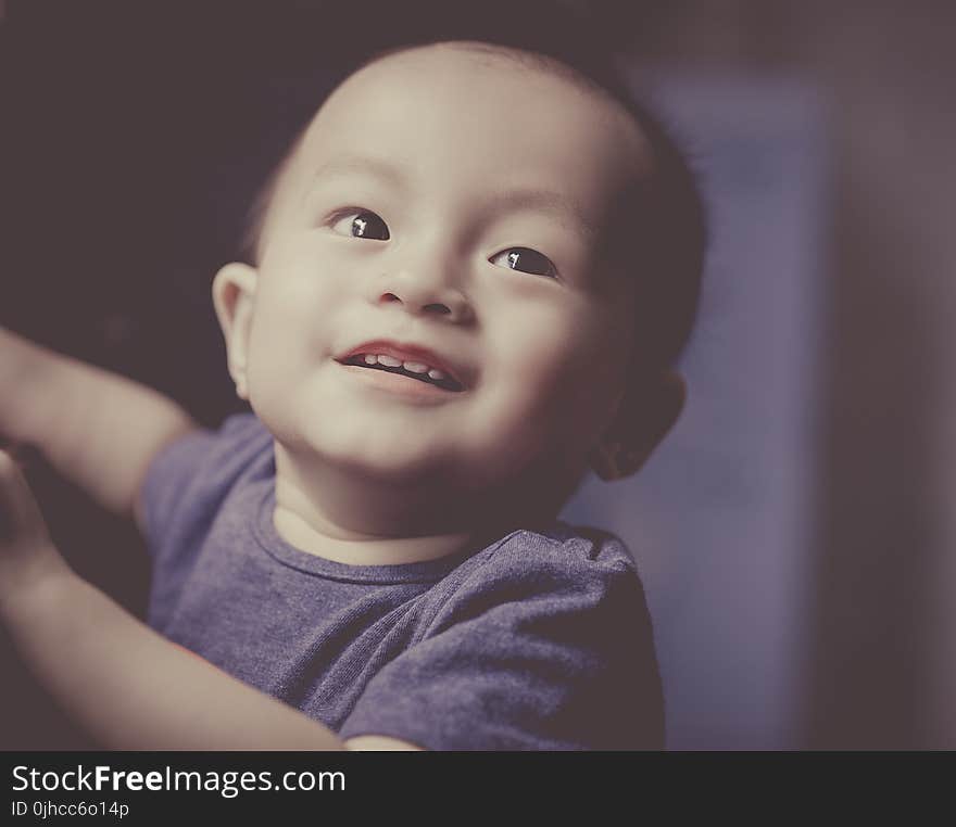 Close-Up Photography of a Smiling baby