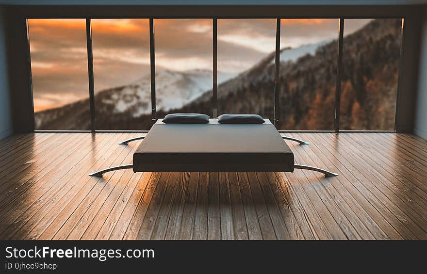 White and Black Mattress Fronting the Mountain