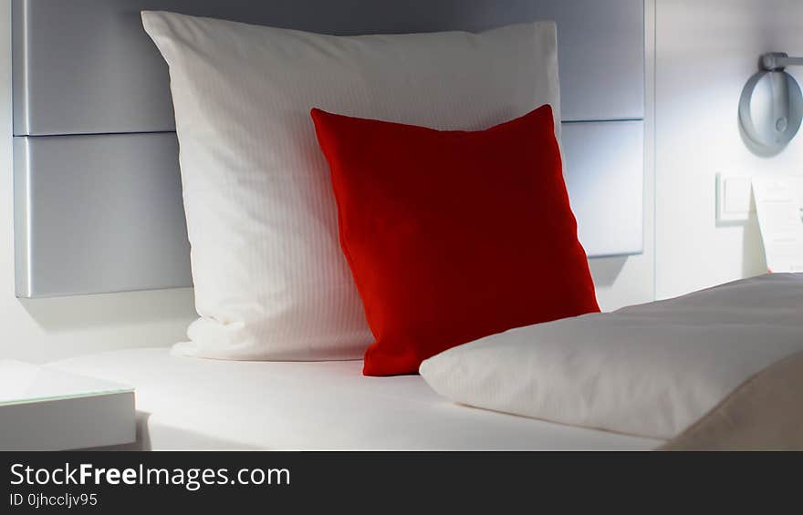 Red and White Bed Pillows