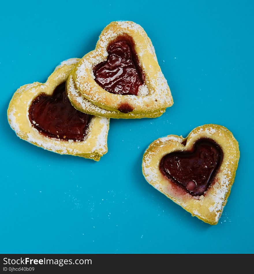 Heart Shaped Cookies On Blue Surface