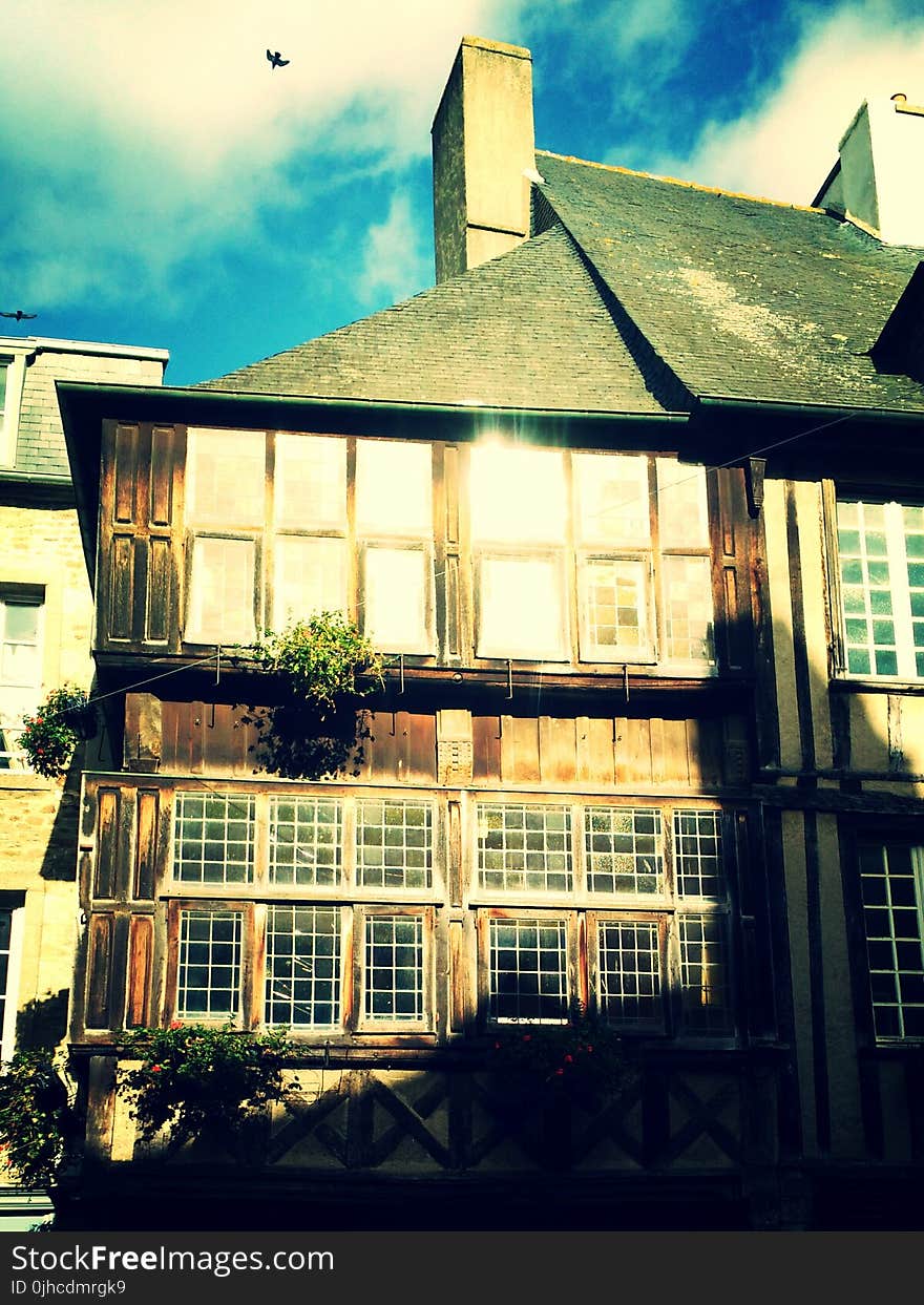 Brown Wooden 2-storey House