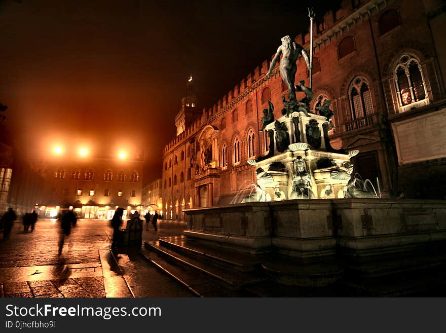 Monument With Water Fountain During Nighttime