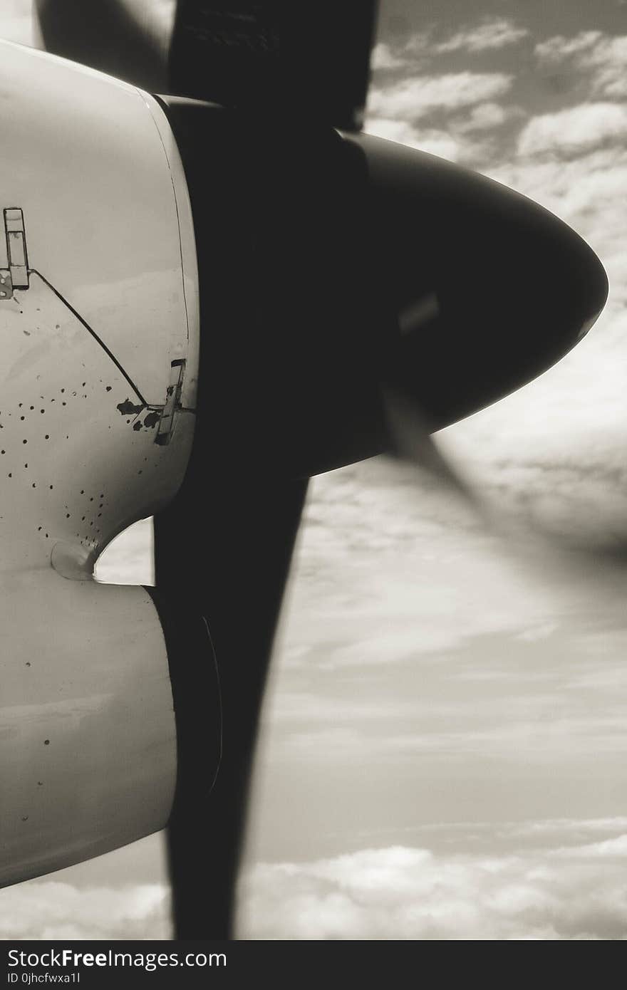 Grayscale Photo Of Airplane Propeller