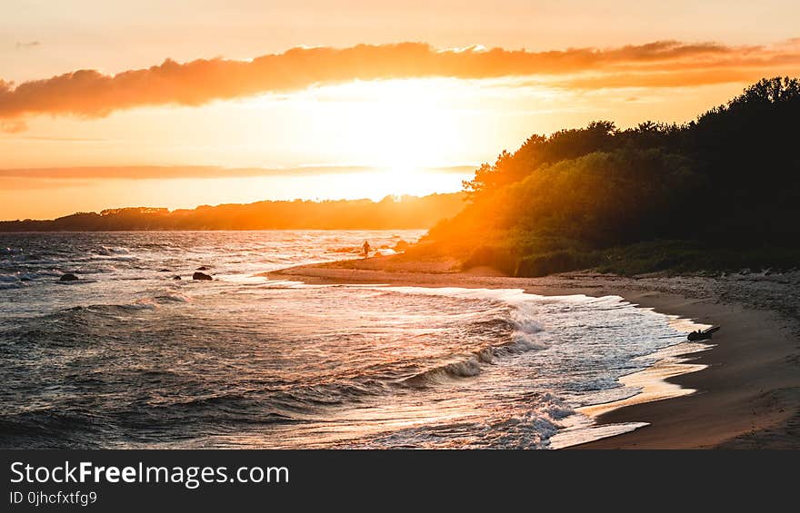 Gray Sand Beach during Sunset