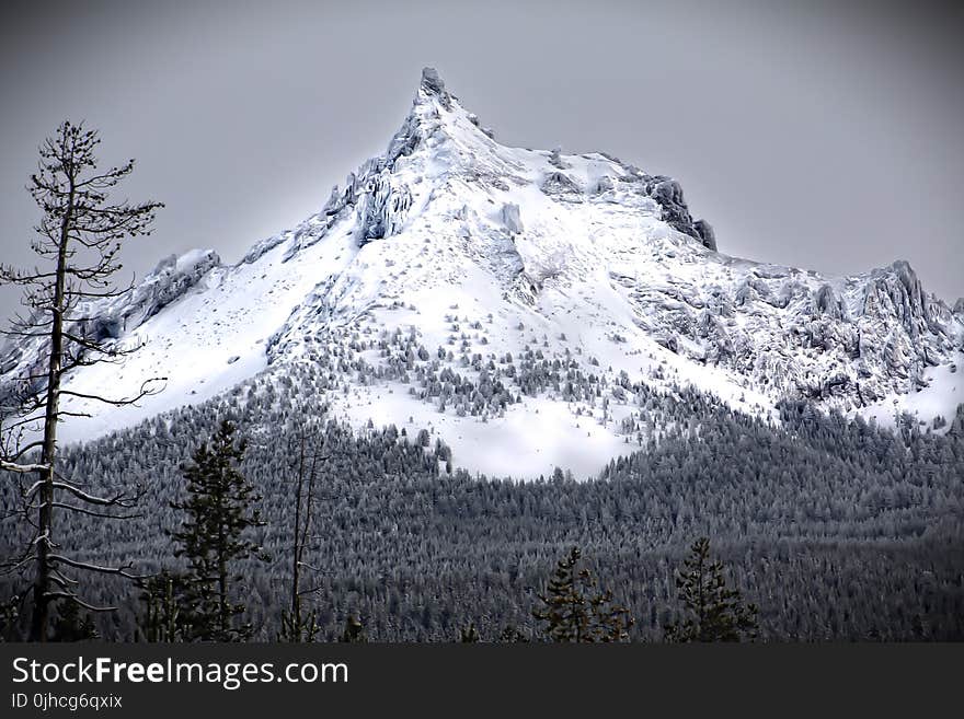 Greyscale Photo Of Mountain Covered With Snow