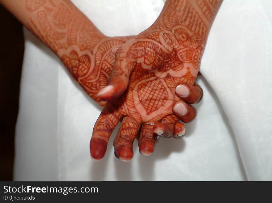 Close-up Photo of Person With Henna Tattoo