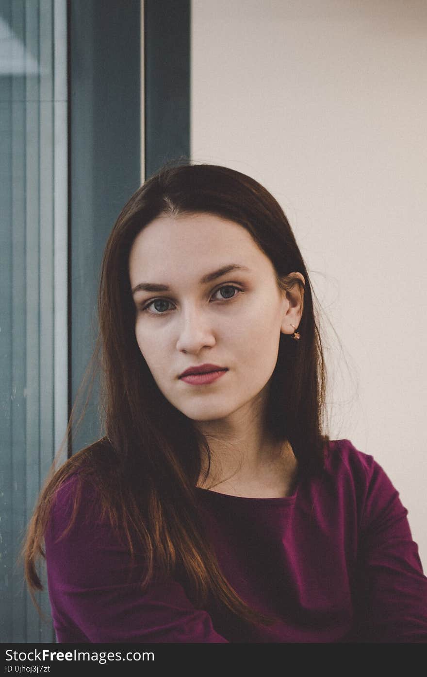 Photography of a Woman Wearing Purple Top