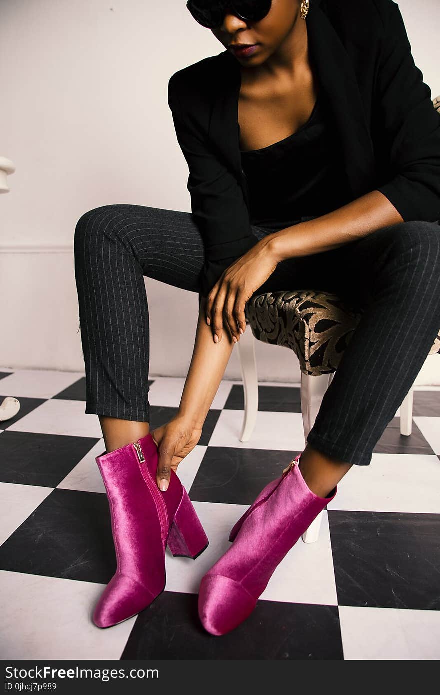 Woman in Black Long-sleeved Shirt and Pairs of Purple Suede Booties