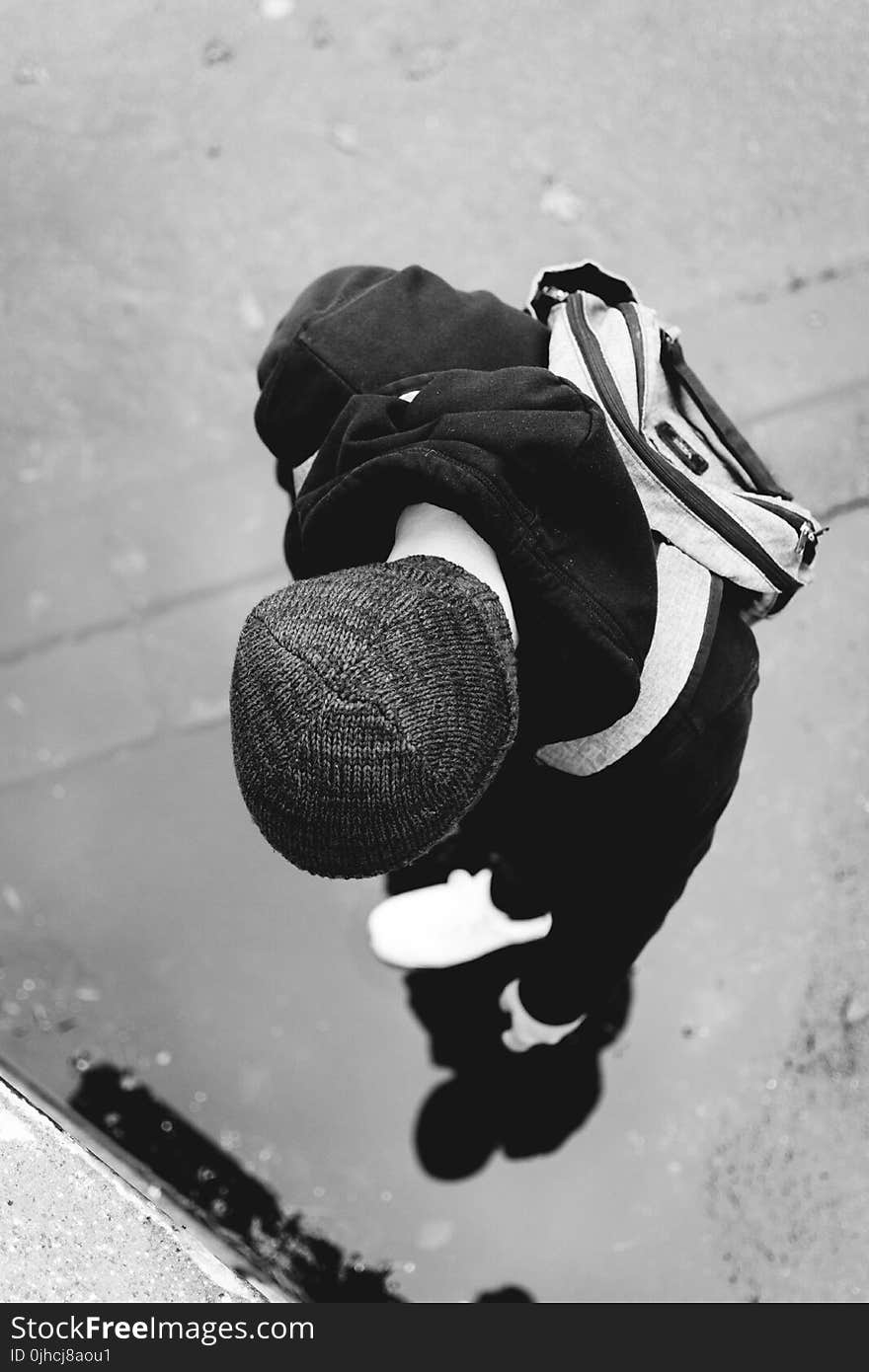 Monochrome Photography of a Person Wearing Beanie