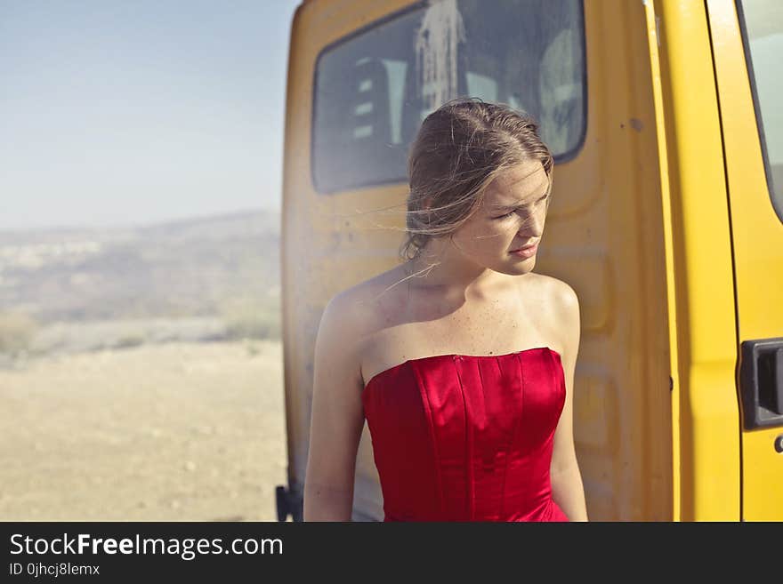 Photography of a Woman Wearing Red Dress