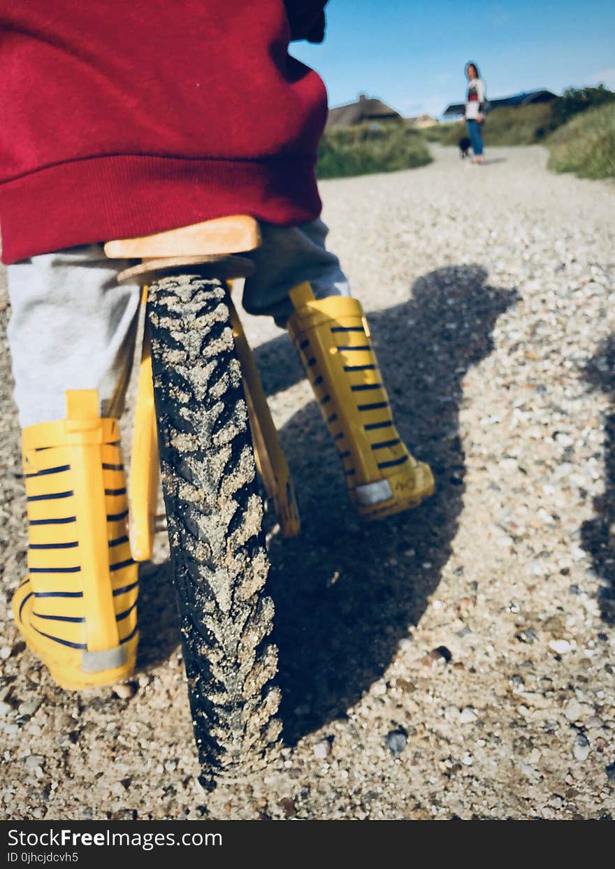 Yellow Bicycle on Brown Sand