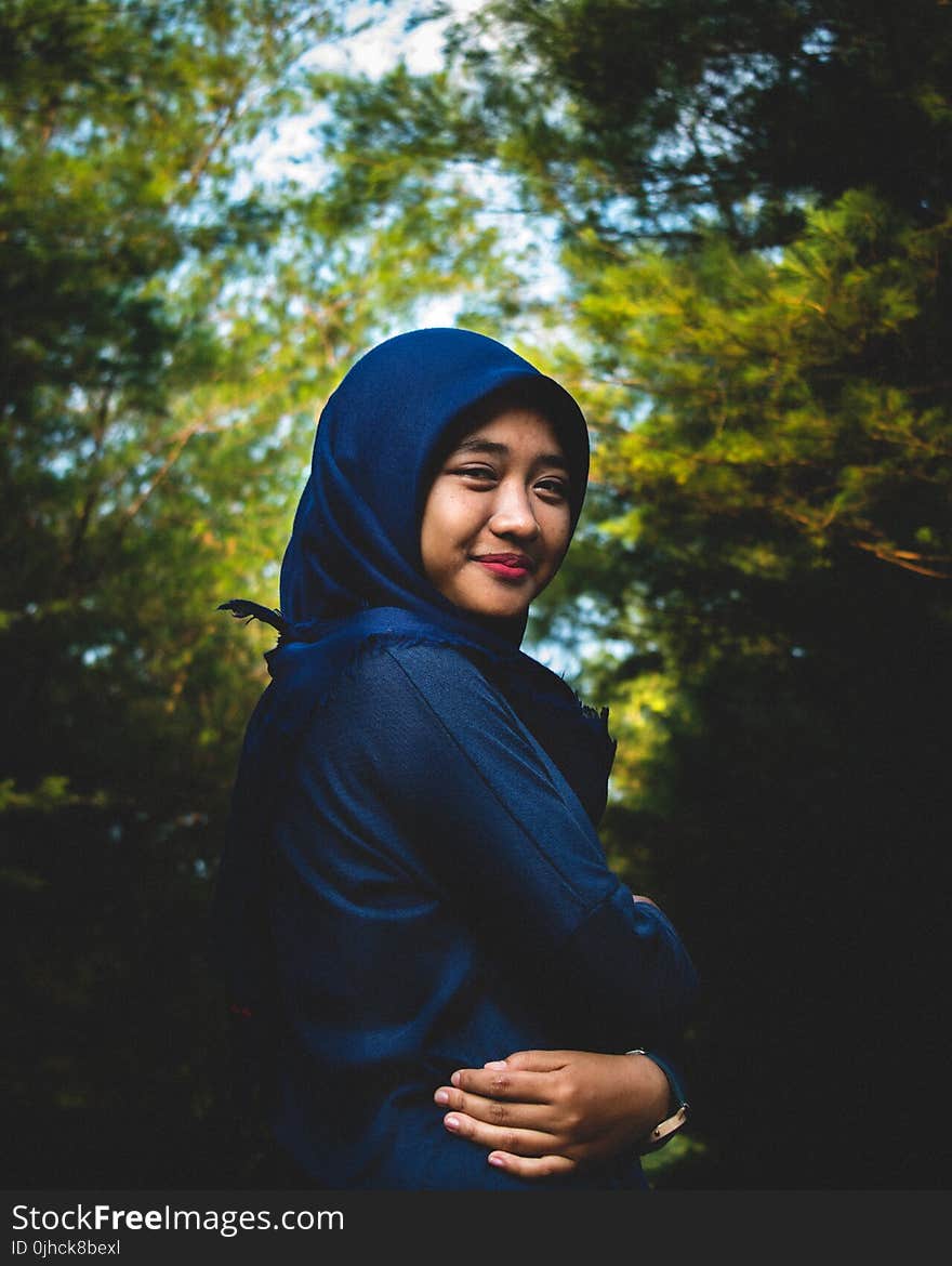 Woman In Blue Hijab And Abaya Traditional Dress