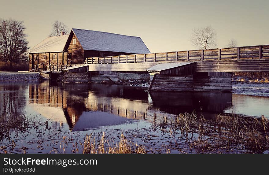 Photo of Wooden House Near the River