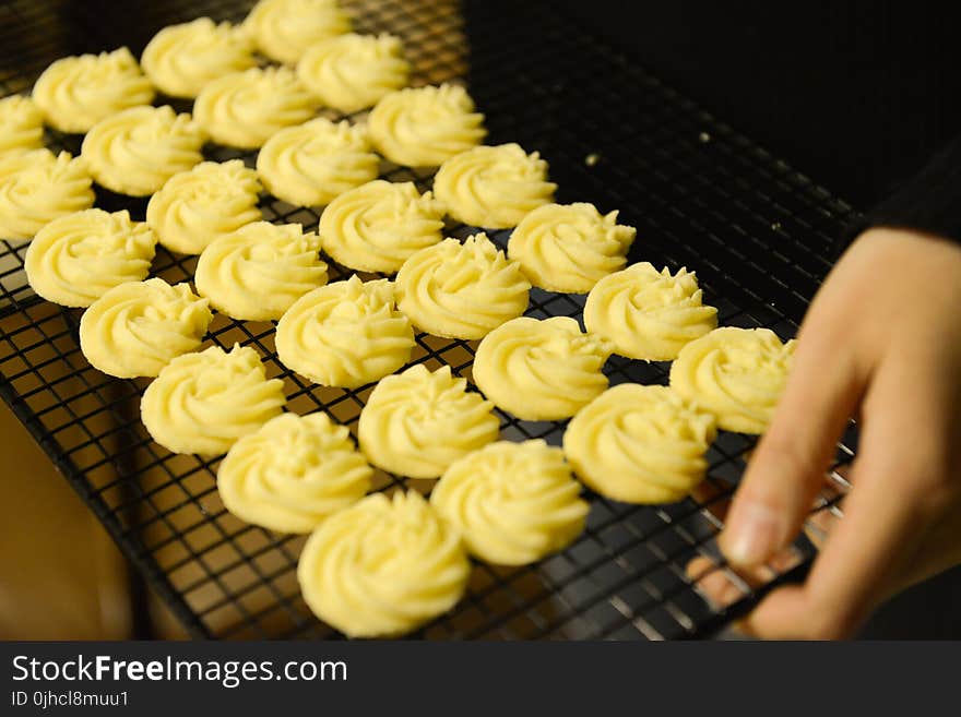 Person Holding Tray of Cookies