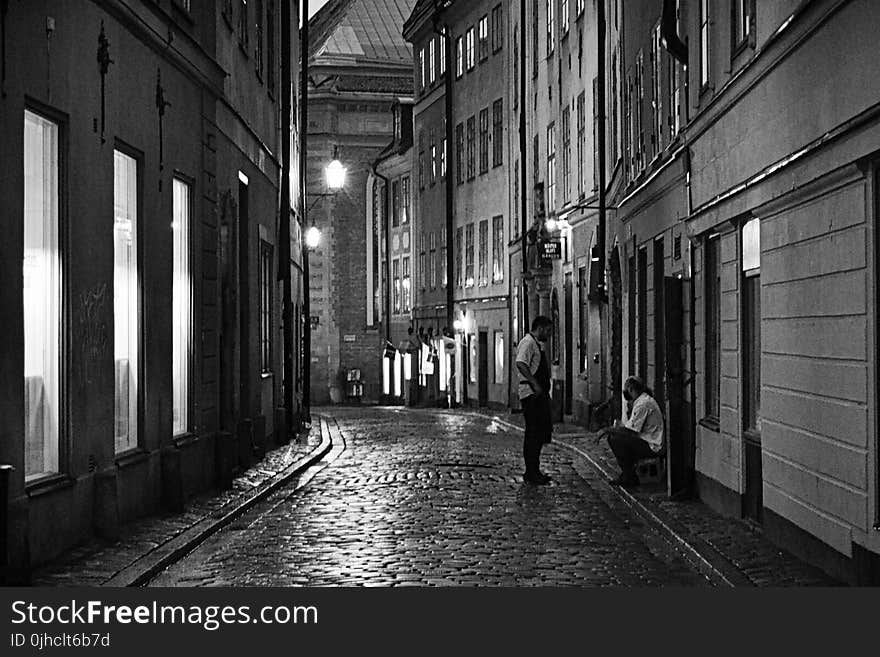 Grayscale Photo of Two Men