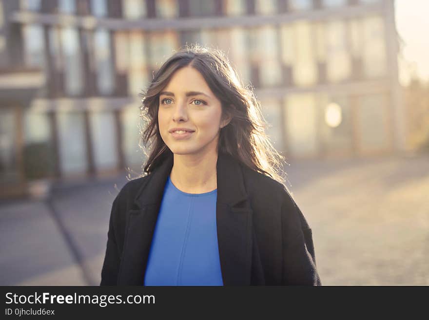 Woman Wearing Black Coat Standing