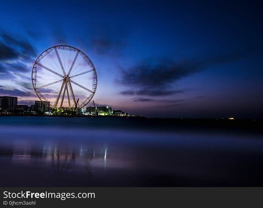 Photography Of Ferris Wheel Near Body Of Water