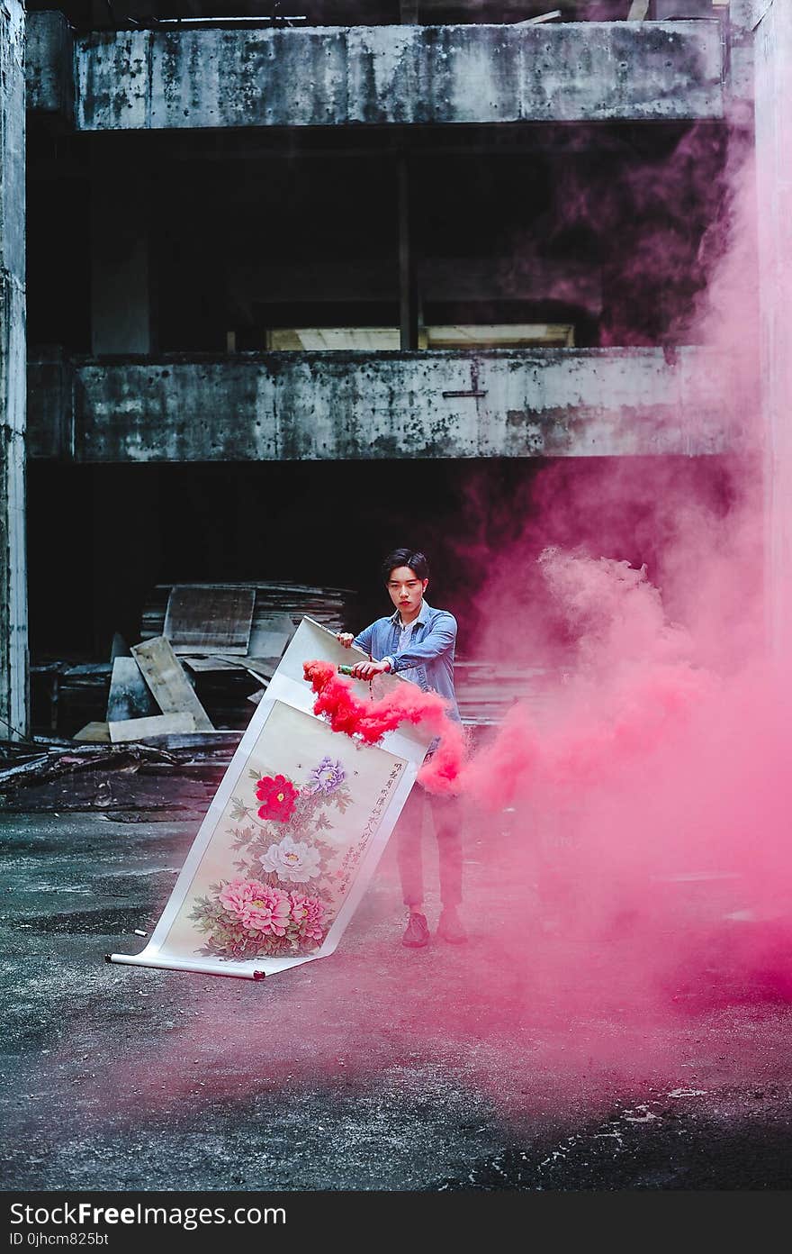 Person Holding Red Smoke Signal