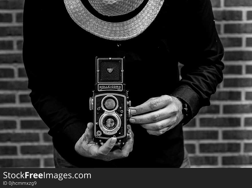 Photo of Person Holding Vintage Camera